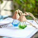 Wooden Triangular Gem-Shaped Lid with a Glass Perfume bottle. VR4234